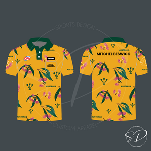 Yellow polo shirt with floral pattern and 'Mitchell Beswick' text on a dark background